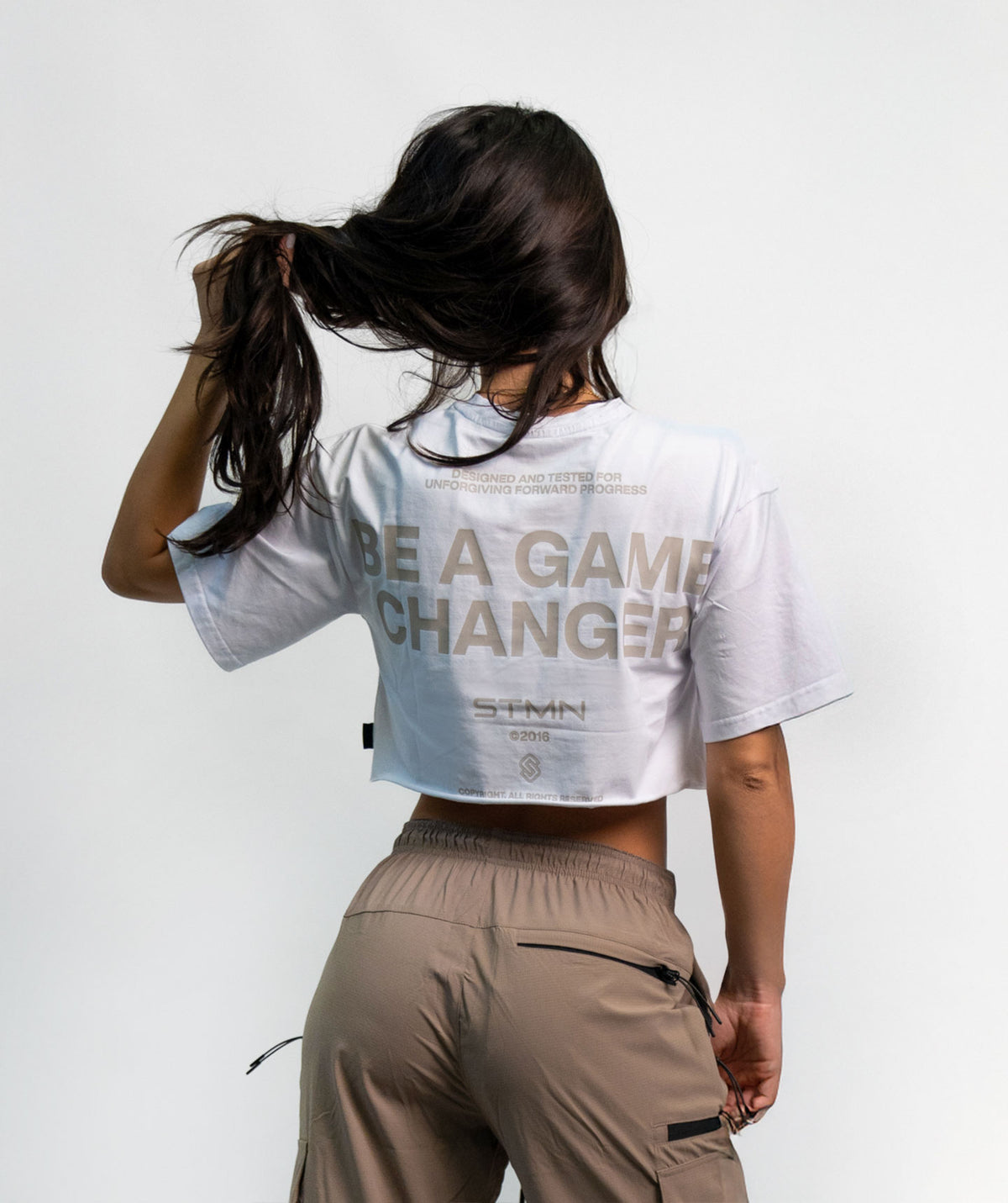 "BE A GAME CHANGER" Cropped Tee SOLID White Woman - STMN Fitness