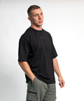 "BE A GAME CHANGER" Loose-Fit Tee SOLID Black Unisex - STMN Fitness