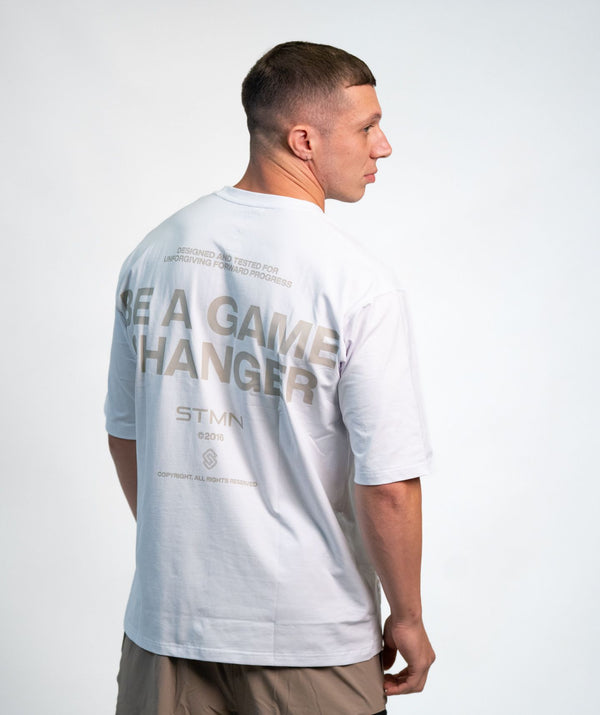 "BE A GAME CHANGER" Loose-Fit Tee SOLID White Unisex - STMN Fitness