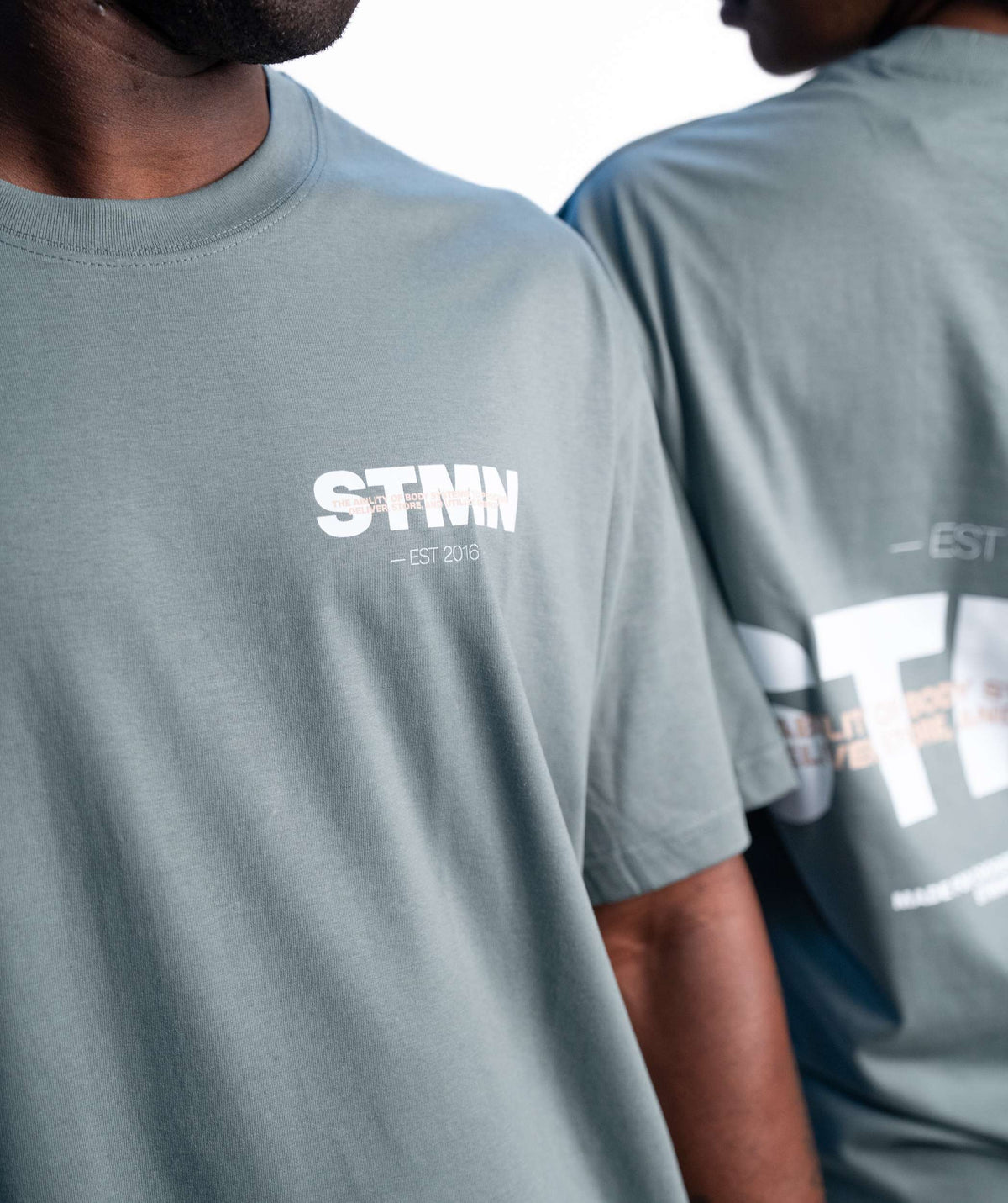 "DOWNTOWN" Loose-Fit Tee Ocean Sand - STMN Fitness