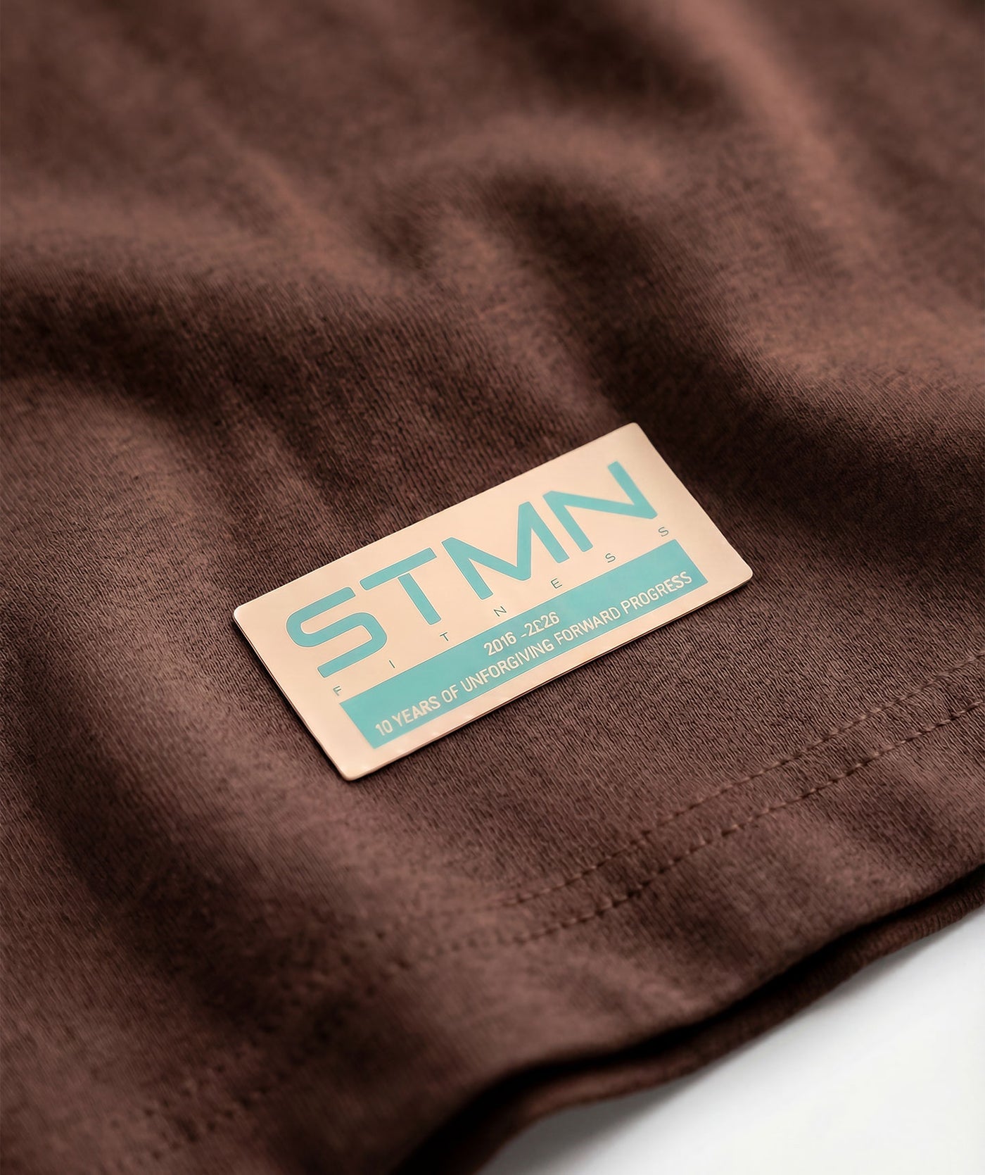 PRE-ORDER "10TH ANNIVERSARY" Loose-Fit Tee Brown / Blue Unisex - STMN Fitness