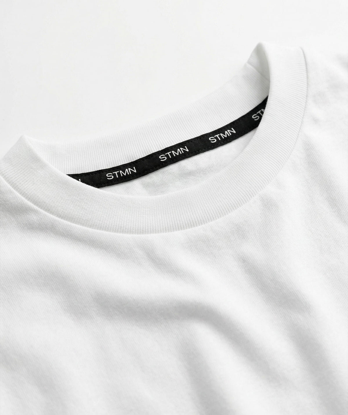 PRE-ORDER "10TH ANNIVERSARY" Loose-Fit Tee Ivory / Orange Unisex - STMN Fitness