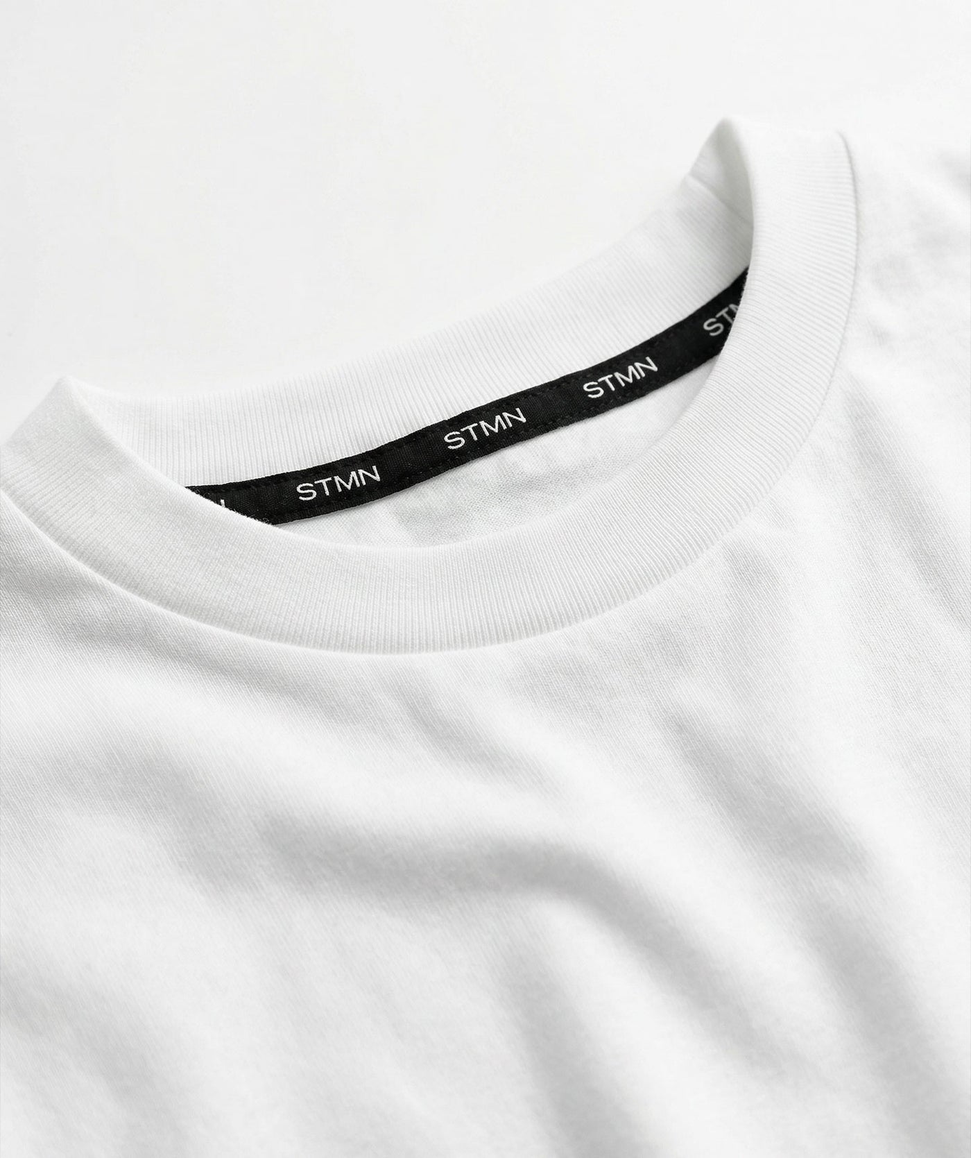 PRE-ORDER "10TH ANNIVERSARY" Loose-Fit Tee Ivory / Orange Unisex - STMN Fitness
