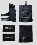 Contenuto della confezione paracalli Hybrid STMN Fitness: coppia di grips, polsini in omaggio, sacchetto in mesh e packaging