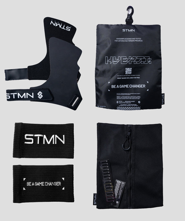 Contenuto della confezione paracalli Hybrid STMN Fitness: coppia di grips, polsini in omaggio, sacchetto in mesh e packaging