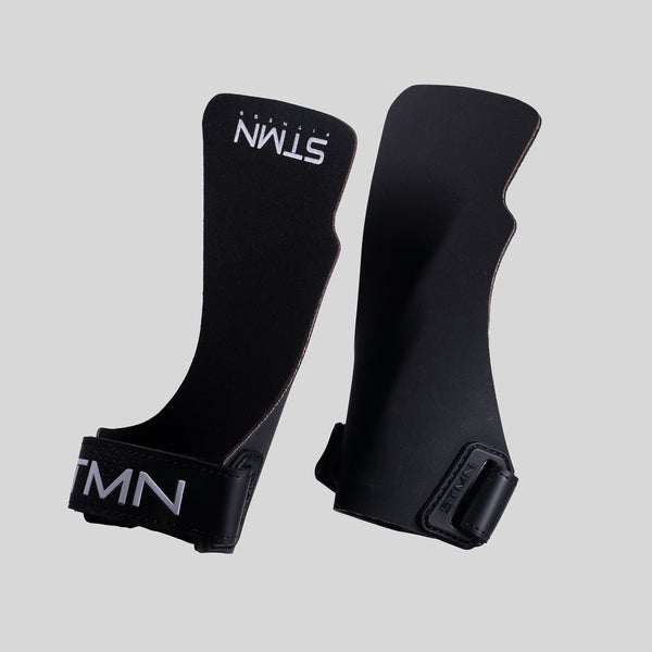 Coppia di paracalli Hybrid STMN Fitness in polimero nero, vista frontale e retro