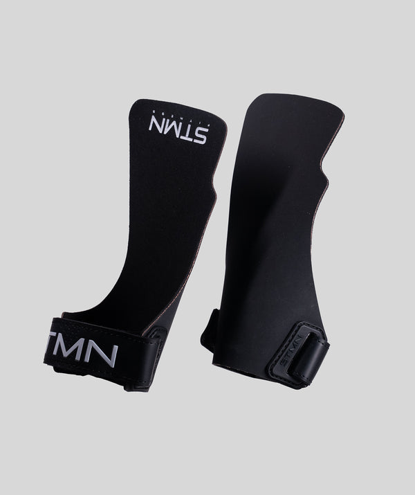 Coppia di paracalli Hybrid STMN Fitness in polimero nero, vista frontale e retro