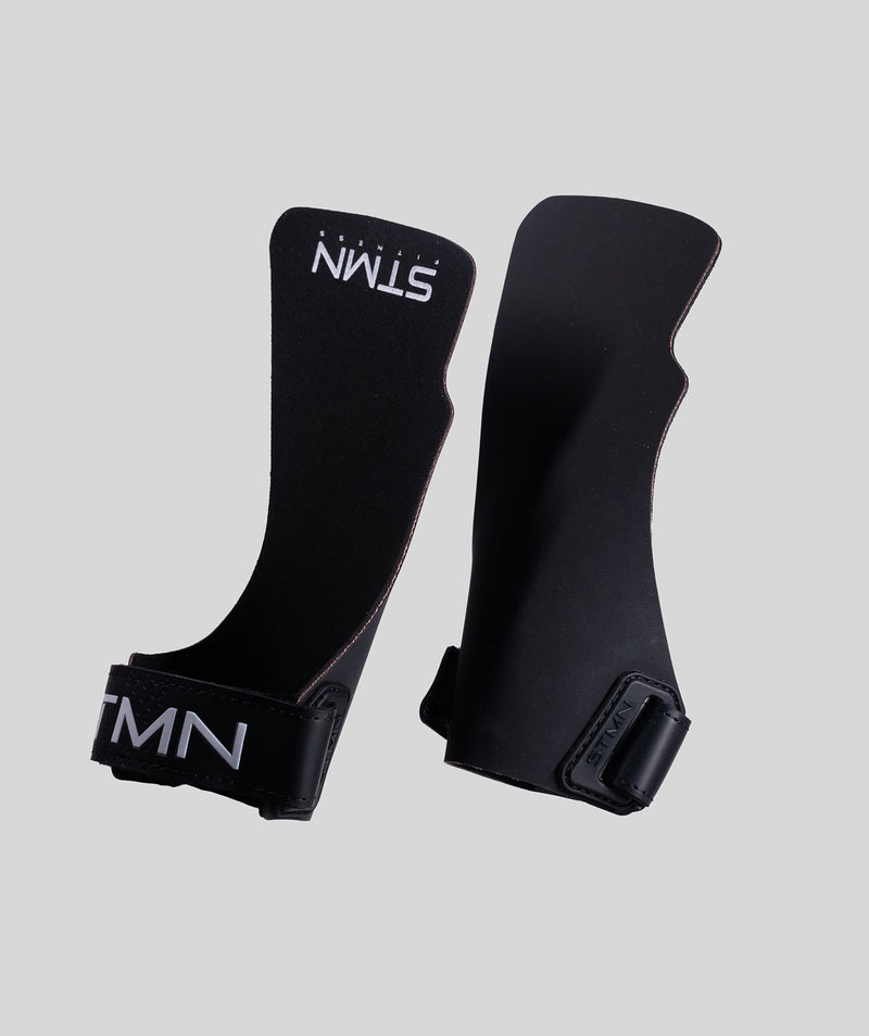 Coppia di paracalli Hybrid STMN Fitness in polimero nero, vista frontale e retro