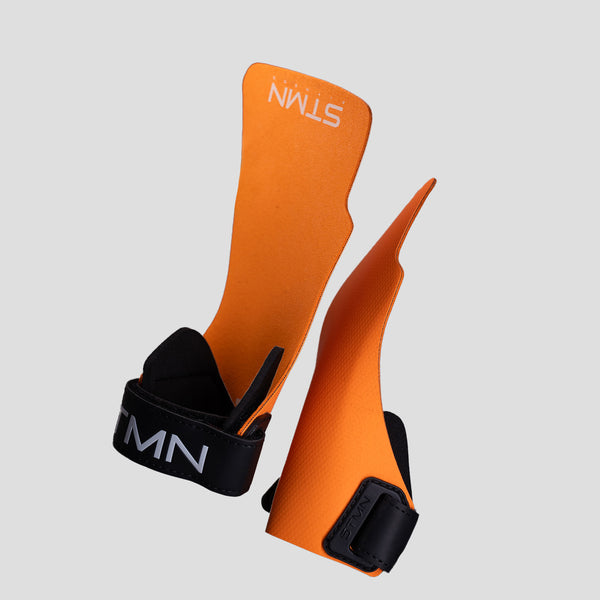 Coppia di paracalli Zero Slim 2.0 STMN Fitness in gomma arancione, vista frontale e retro